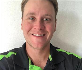 Male, smiling, wearing Servpro polo shirt